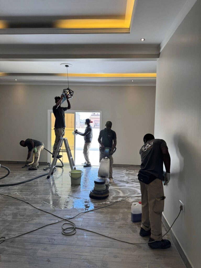 Al-Jawhara Cleaning workers during post-construction cleaning